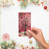 Hand holding a small rectangular card with a floral design on a decorative background with Christmas elements.