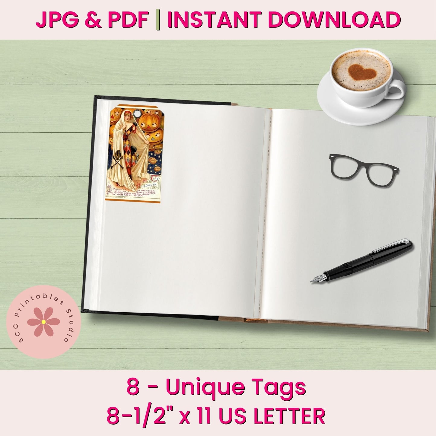 An open blank journal or notebook on a pale green wood background, styled with a small art print, eyeglasses, and a black pen. Pink text at the top and bottom reads 'JPG & PDF | INSTANT DOWNLOAD' and '8 - Unique Tags 8-1/2" x 11 US LETTER'.