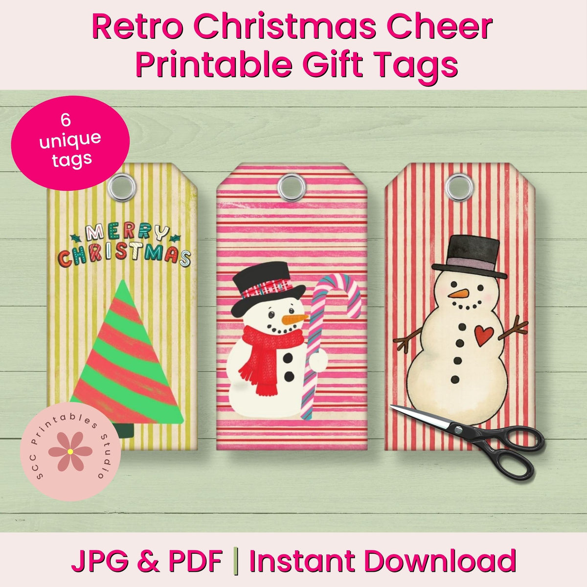 Retro Christmas cheer printable gift tags shown as a digital product preview with three sample tag designs: yellow and green striped with a Christmas tree and 'Merry Christmas' text, pink and red striped with a snowman holding a candy cane, and red and pink vertical stripes with a snowman face. Pink text reads 'Retro Christmas Cheer Printable Gift Tags' and '6 unique tags'; scissors and a pink circle badge are included in the mockup.