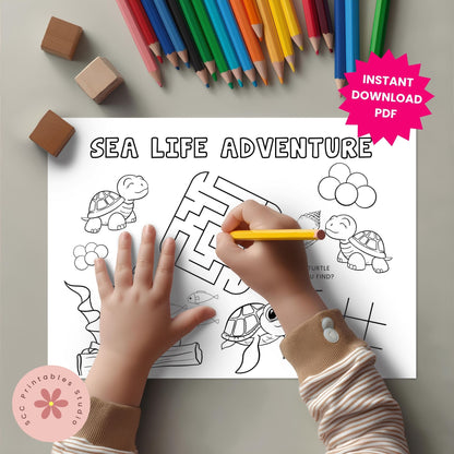 Coloring sheet titled 'Sea Life Adventure' with a hand holding a pencil, surrounded by colored pencils and blocks.
