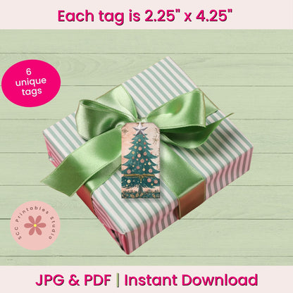 A wrapped gift box with pink and white stripes, a green satin ribbon, and a Christmas tree tag on a pale wood background. Text at the top and bottom reads 'Each tag is 2.